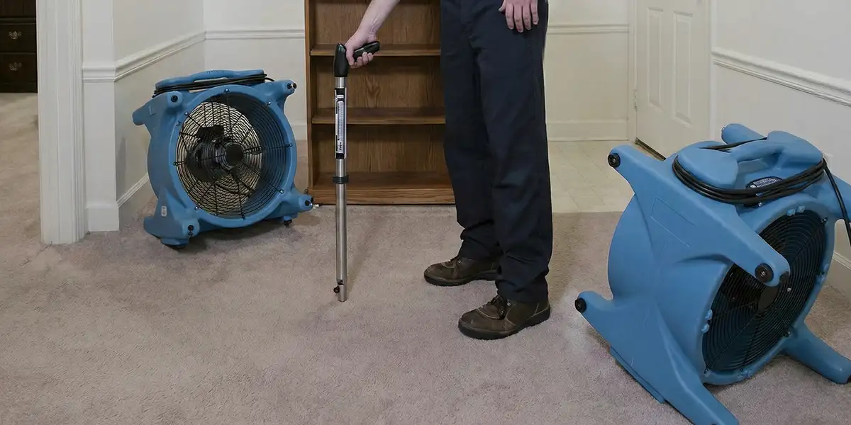 emergency water removal equipment deployed to dry a flooded residential interior in Cambridge, MA